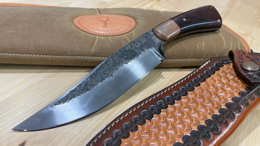 Cuchillo Bowie Guillermo Garcimonte en Ironwood, incluye cuño Journeyman Smith Performance Test.